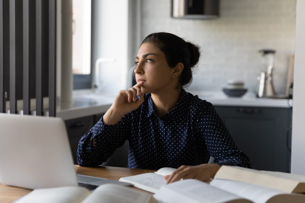 Lady deciding which life insurance policy is best for them