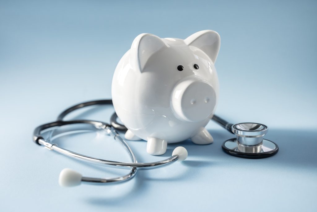 Piggy bank with stethoscope